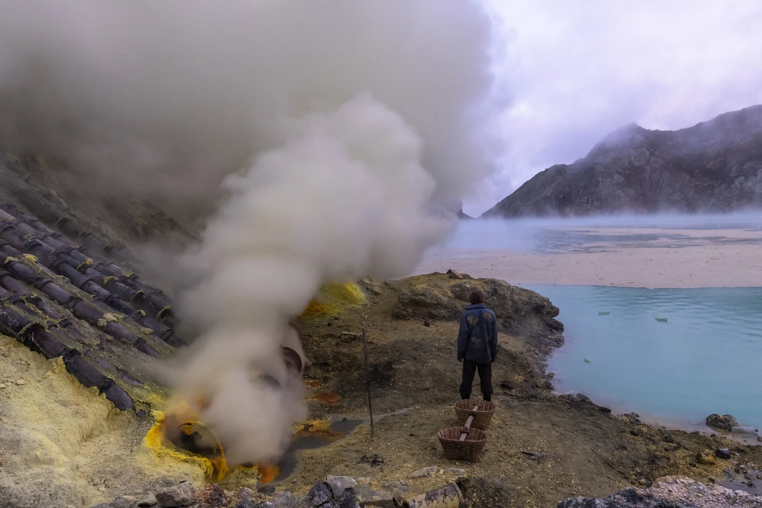 First light over the fumarole pipes and the acid lake