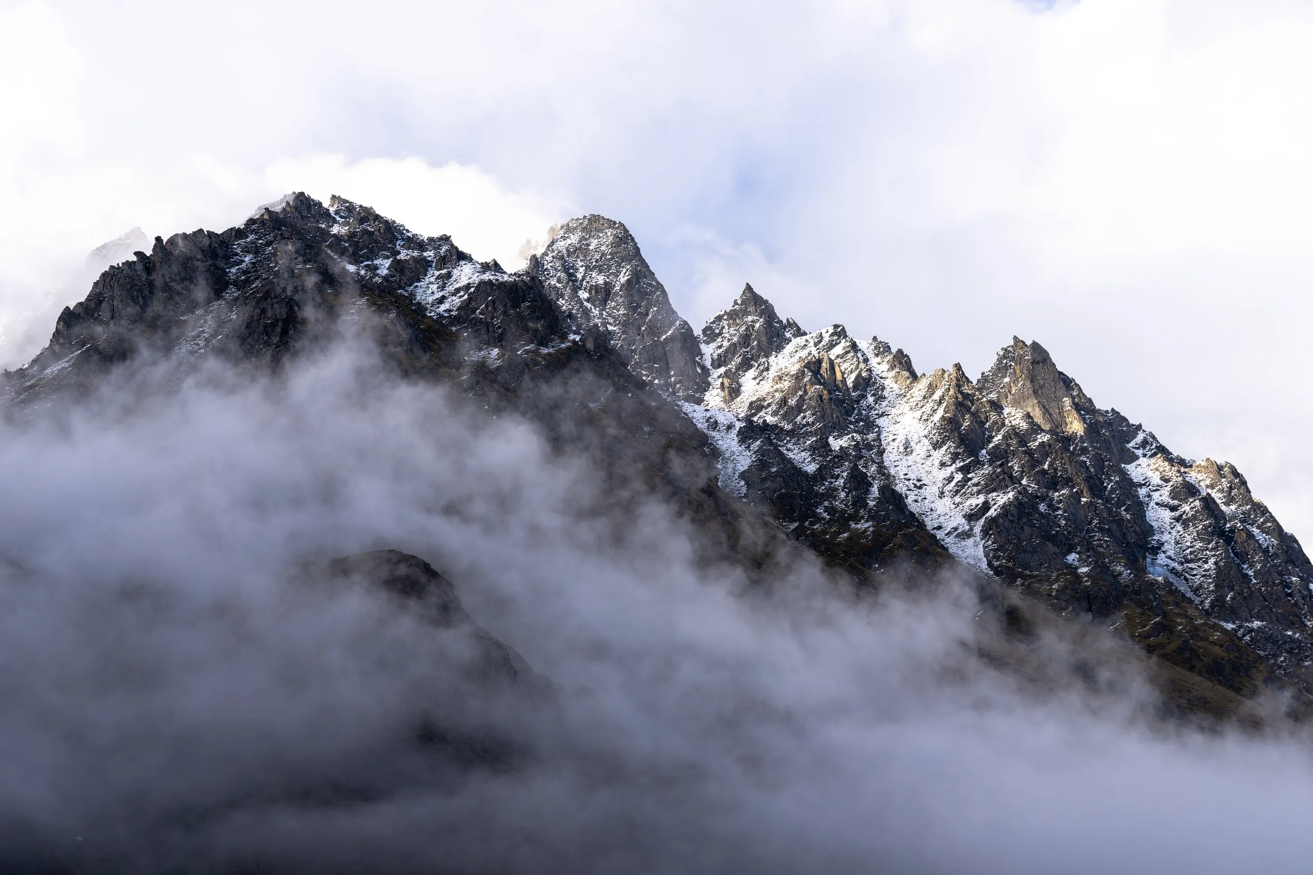 Peak emerging from clouds